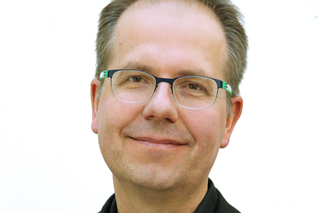 Headshot of Karsten Heeger.